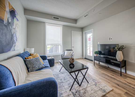 a living room with a couch and a coffee table