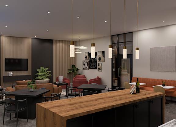 A modern dining area with a wooden table and chairs.