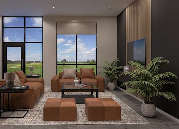 A modern living room with a large window and a view of the sky.