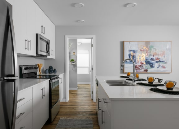 a kitchen in a 555 waverly unit