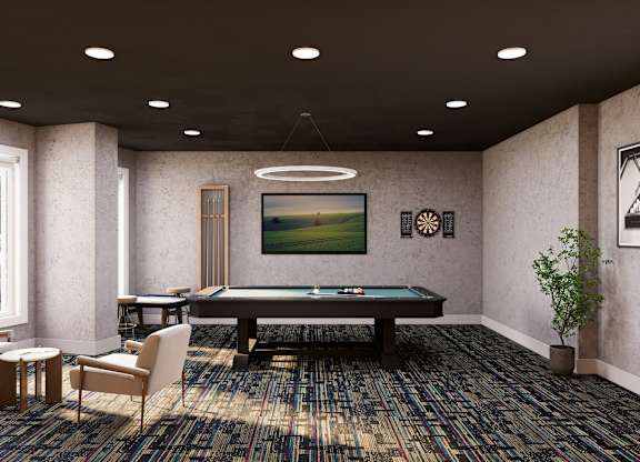 A room with a pool table and a painting on the wall.