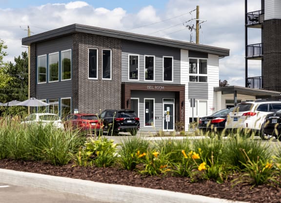 a building with a parking lot in front of it