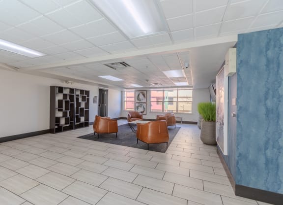 an empty waiting room in a hospital with leather chairs at ParcOne60, Reno, 89501