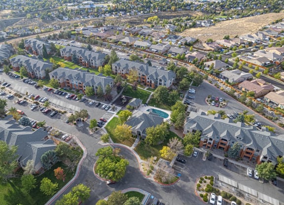 an aerial view of a neighborhood with houses and cars at Austin Crest Apartments, Reno, NV, 89523