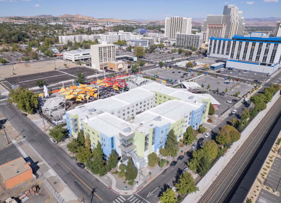 an aerial view of a city with buildings and a construction site at The Onyx at 695, Reno