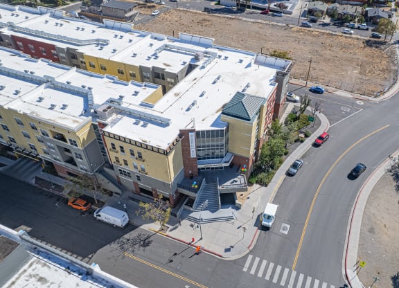 an aerial view of a city street and buildings with snow at ParcOne60, Reno, 89501