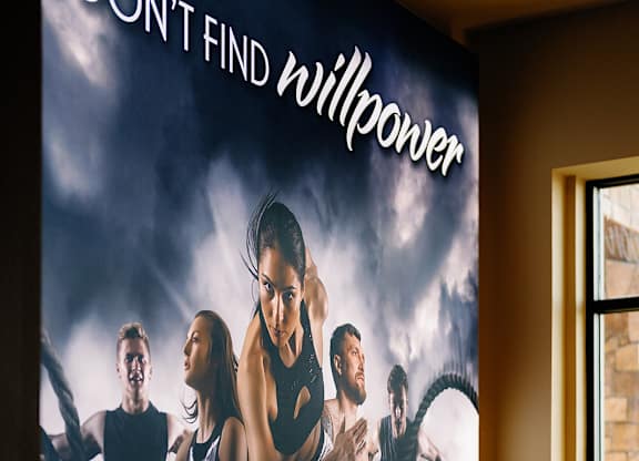 A poster for a movie with the title "You Don't Find Willpower, You Create It!" featuring a group of people in action poses.