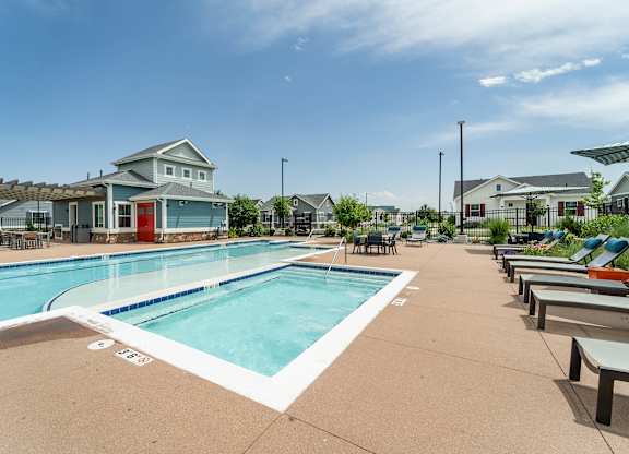 our apartments have a swimming pool with lounge chairs