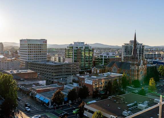 A cityscape with a church and other buildings.