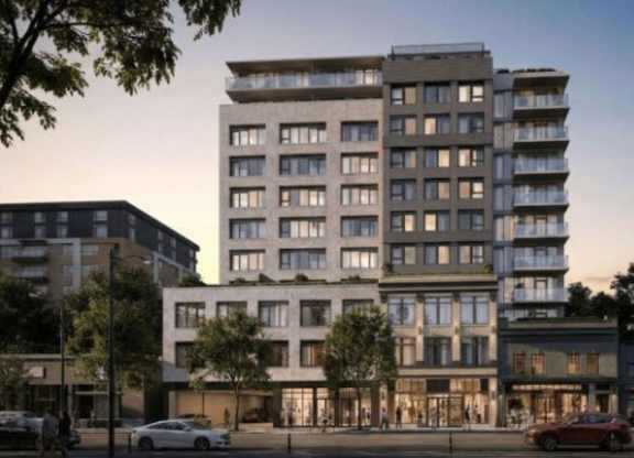 A modern apartment building is depicted in the image.