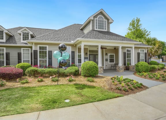 a house with balloons in front of it
