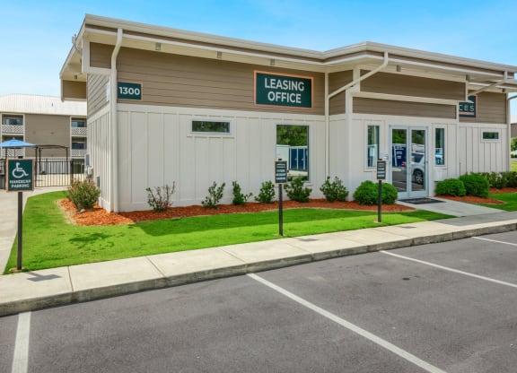 a building with a leasing office on the side of it