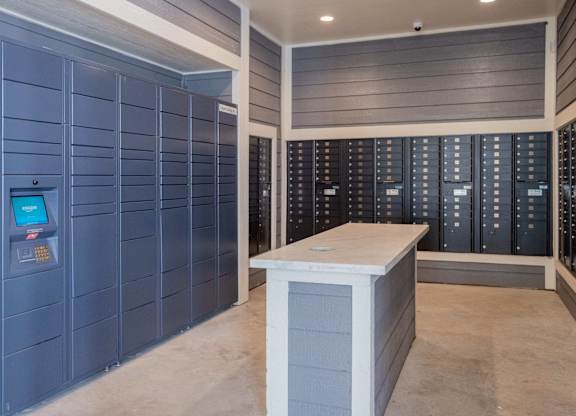 A bank vault room with a white counter and a blue wall.