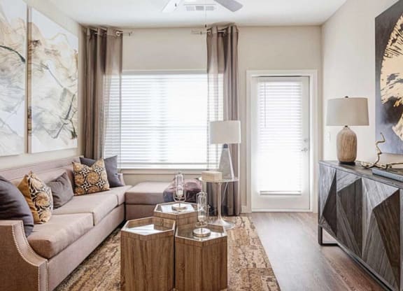 a living room with a couch and a table