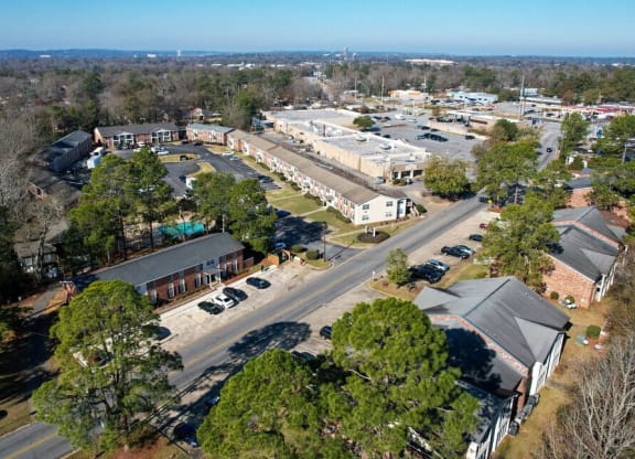 an aerial view of a city street and buildings