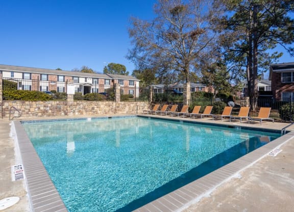 our apartments have a swimming pool with lounge chairs
