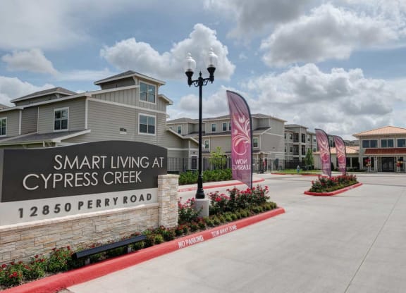 Front sign and gate at Smart Living at Cypress Creek