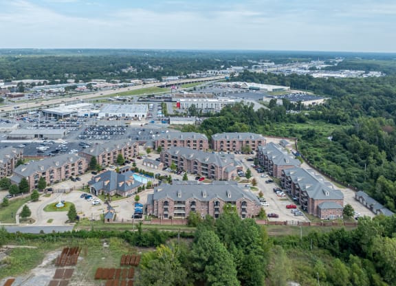 an aerial view of a parking lot in a city