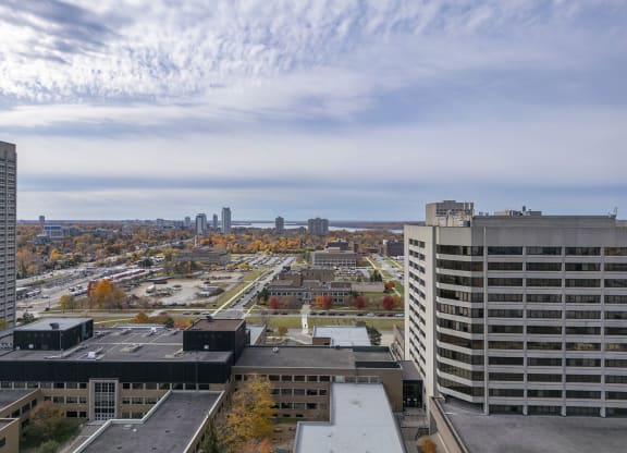the view of the city from the top of a building