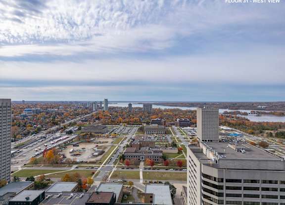 a view of the city from the top of a skyscraper