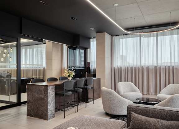 A modern living room with a bar area