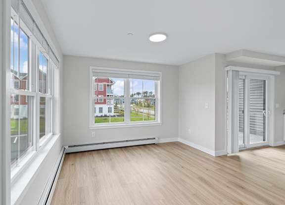 Surrounded by Windows—Your Main Living Area Flooded with Natural Light and Varying Views