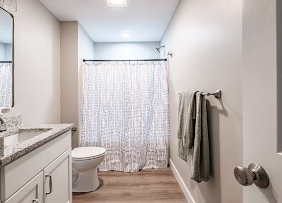 Bathroom with shower and vanity at Windham Village Apartments, Windham, Maine