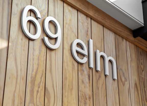 a sign on the side of a building with the go affirm logo on it