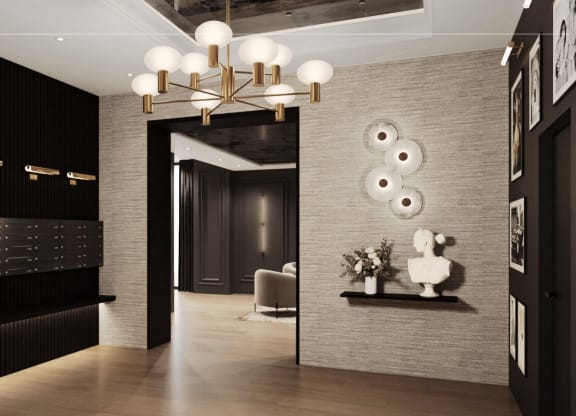 a hallway with a large mirror and a chandelier at Chateau on Wells, Chicago, Illinois