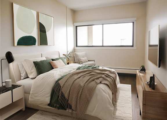 a bedroom with a bed and a window
