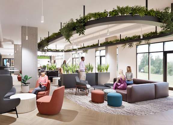A modern living room with a curved ceiling and a variety of seating options.