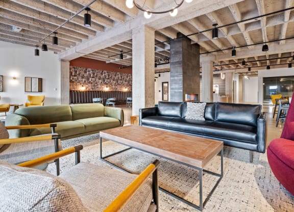 a living room with couches and a coffee table
