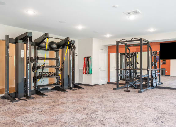 the gym at the flats at big tex apartments