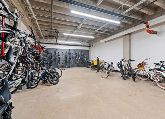 a large room filled with bikes in a garage