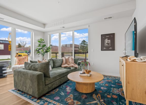 a living room with a couch and a coffee table