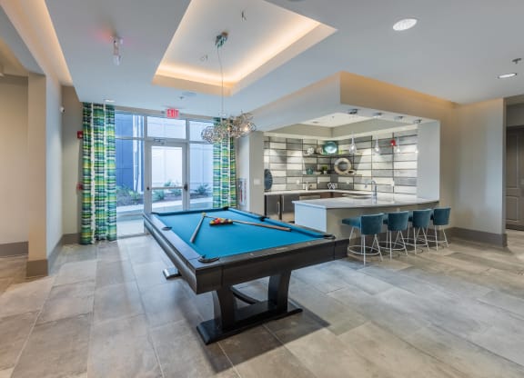 play a game of pool in our clubhouse atrium