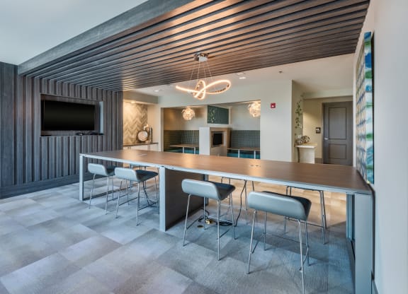 a conference room with a long table and chairs