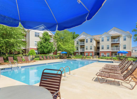 swimming pool with pool chairs