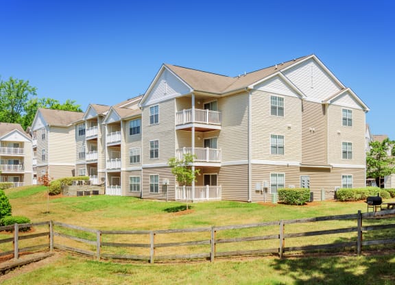 building with wooden fence