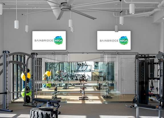 A gym with a sign that says Bainbridge NDVA.