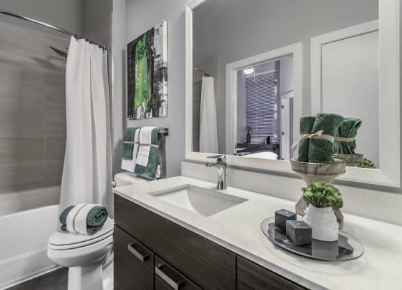 bathroom with quartz countertops