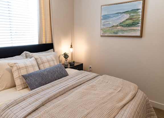 Four Seasons Logan Apartments and Townhomes Bedding in Main Bedroom