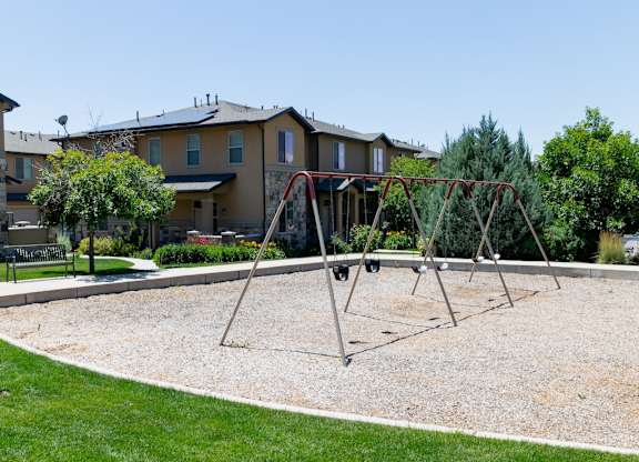 Four Seasons Logan Apartments and Townhomes Swingset at Playground