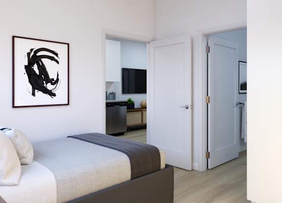 A bedroom with a bed, a painting, and a door leading to another room.