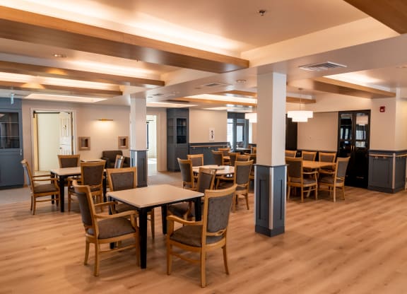 a large room with tables and chairs