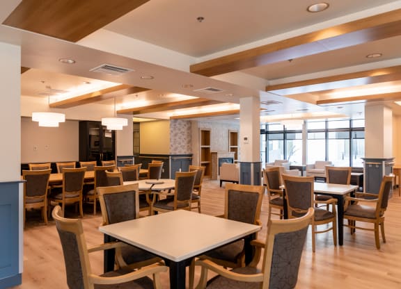 a large room with tables and chairs
