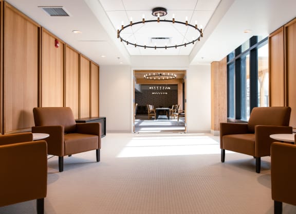 a large room with chairs and tables