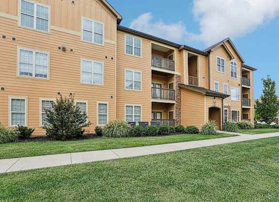 our apartments at the district feature a spacious yard and green grass