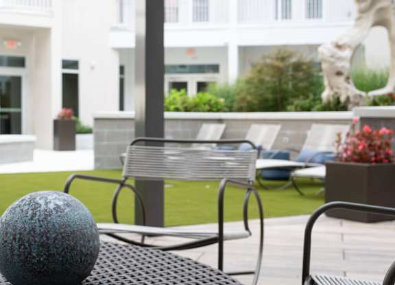 Detail of the outdoor lounging area at Novi Rise Apartments in Concord, NC