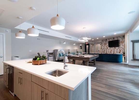 With a fully equipped kitchen, Novi Rise's resident lounge is the perfect place to host a party